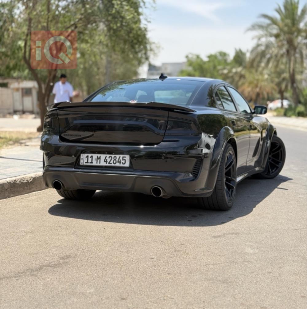 دۆج چارجەر